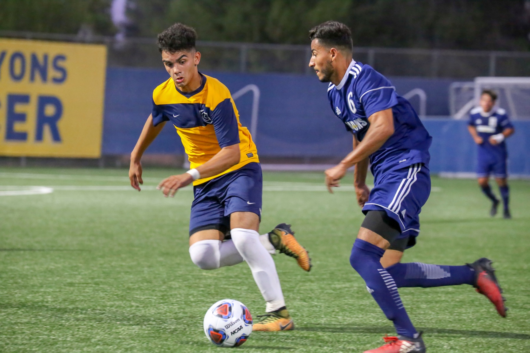 College of the Canyons sophomore Jorge Rojas dribbles the ball downfield vs. Cypress College in the 2018 season opener. By Jesse Muñoz/COC Sports Information Director