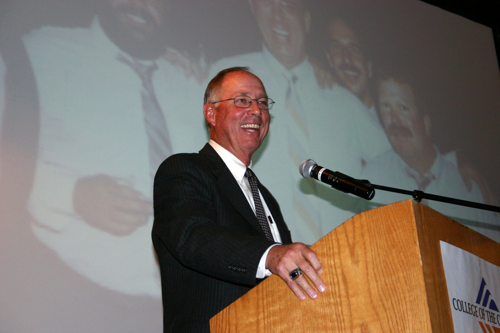 Stock image of former COC baseball head coach Mike Gillespie speaking at a past Hall of Fame event.