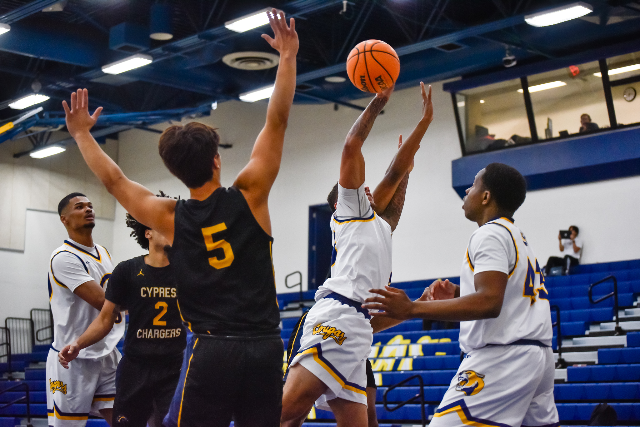 Action shot from College of the Canyons men's basketball vs. Cypress College on Dec. 13, 2023.