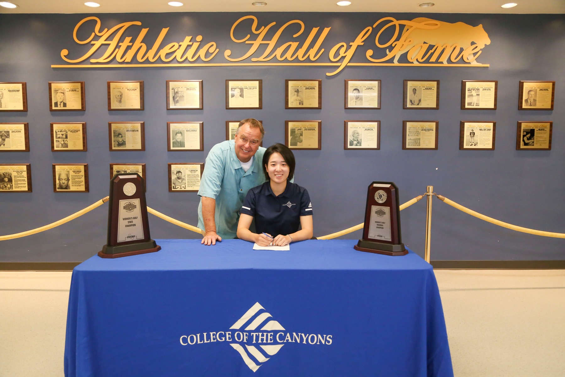 COC women's golf player Jessie Lin appears with head coach Gary Peterson.
