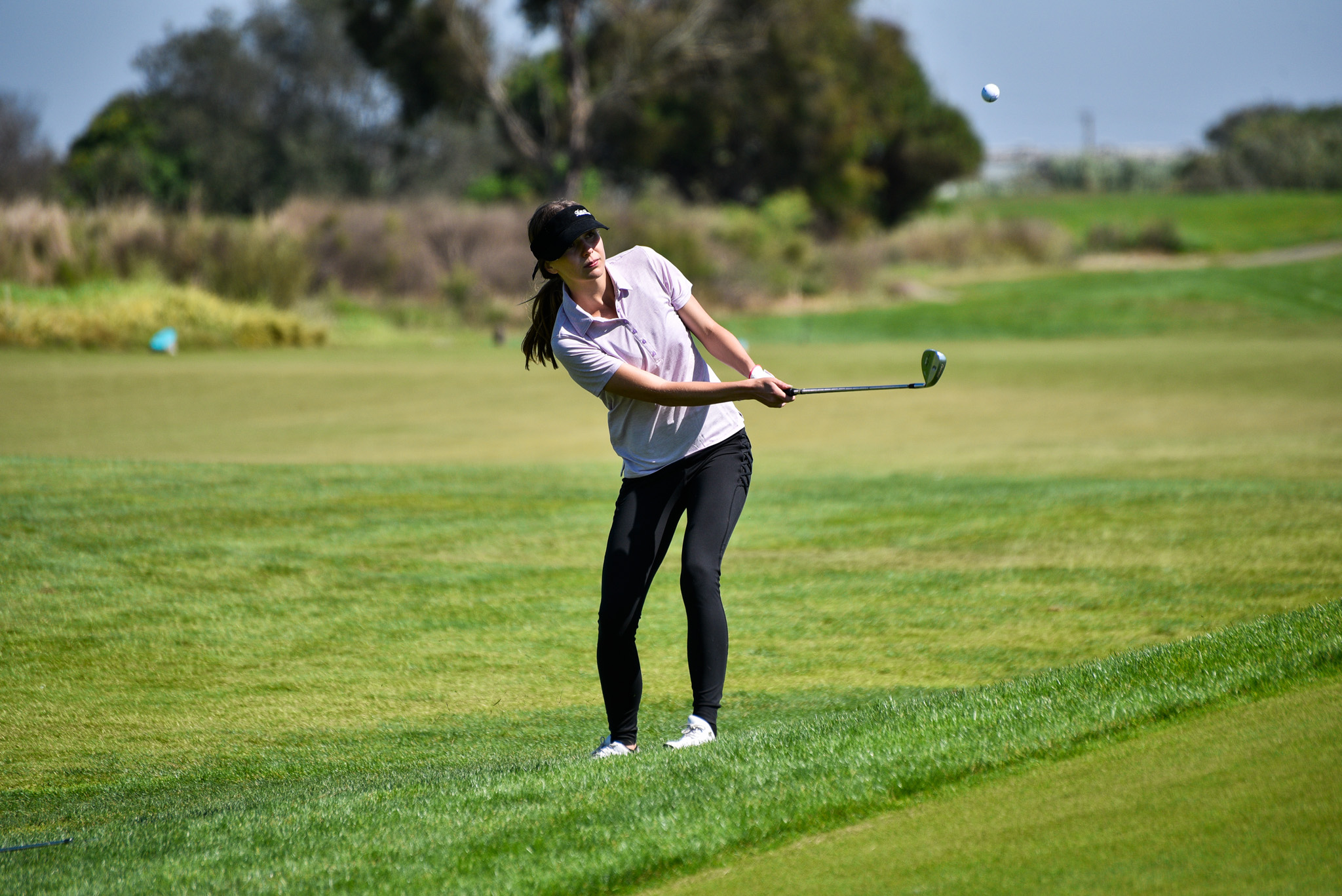 Stock action image of College of the Canyons women's golf student-athlete Brooke Maxwell.